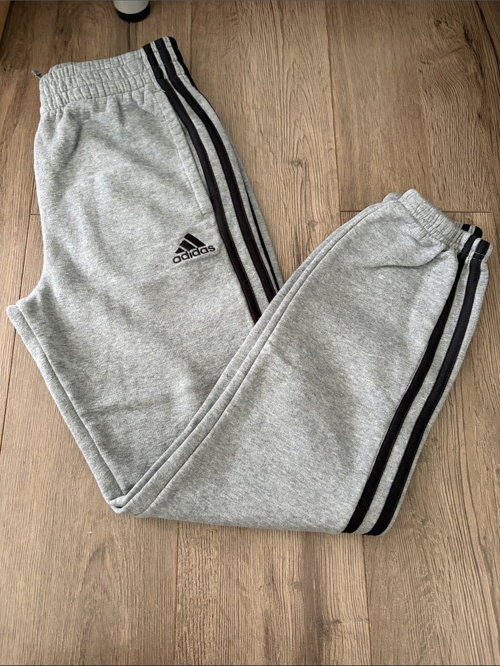 adidas Kids Light Gray Sweatpants with Black Stripes. Boys size medium 10/12